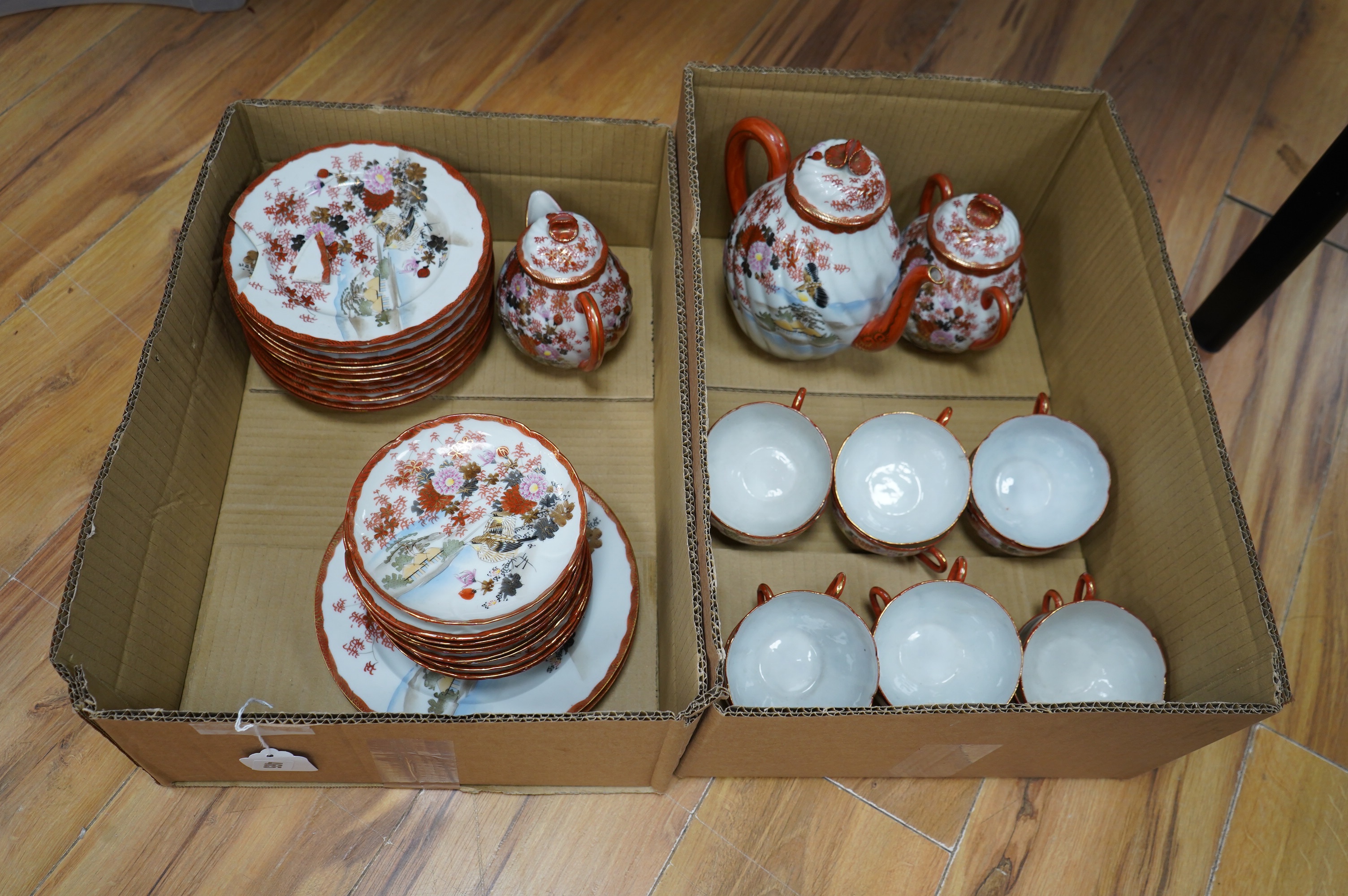 A Japanese egg shell porcelain tea set to include teapot, trios and milk jug. Condition - a few minor breakages, mostly good